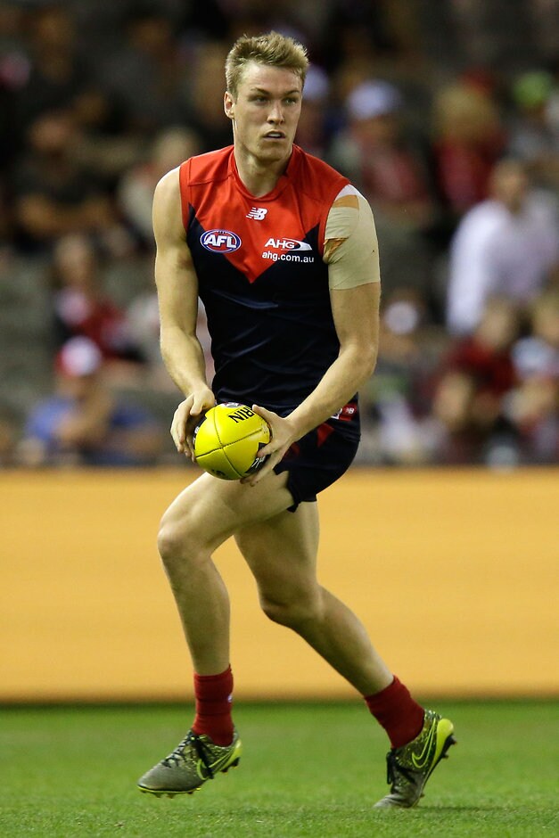 AFL 2016 Rd 06 - Melbourne v St Kilda MELBOURNE, AUSTRALIA - APRIL 30: Tom McDonald of the Demons runs with the ball during the 2016 AFL Round 06 match between the Melbourne Demons and the St Kilda Saints at Etihad Stadium, Melbourne on April 30, 2016. (Photo by Darrian Traynor/AFL Media)